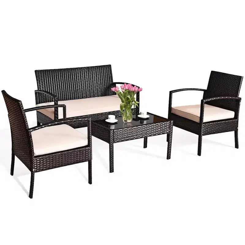 Salon de jardin 4 pièces Costway en rotin avec coussins et table en verre