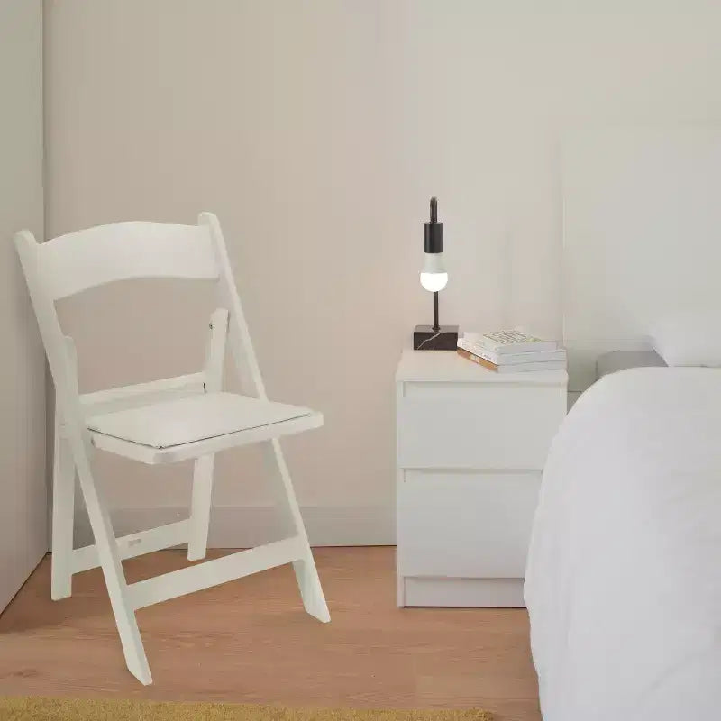 Chaise pliante en résine Elama 4 pièces en plastique blanc avec coussin d'assise amovible